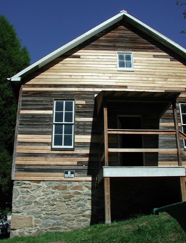 unpainted schoolhouse front door